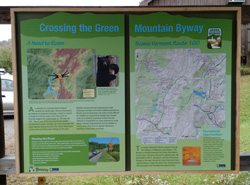 An educational panel describes the wildlife along the Green Mountain Byway.