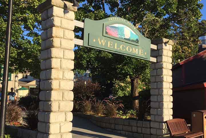 A photo of the welcome sign in summer at Smugglers' Notch  Resort.t