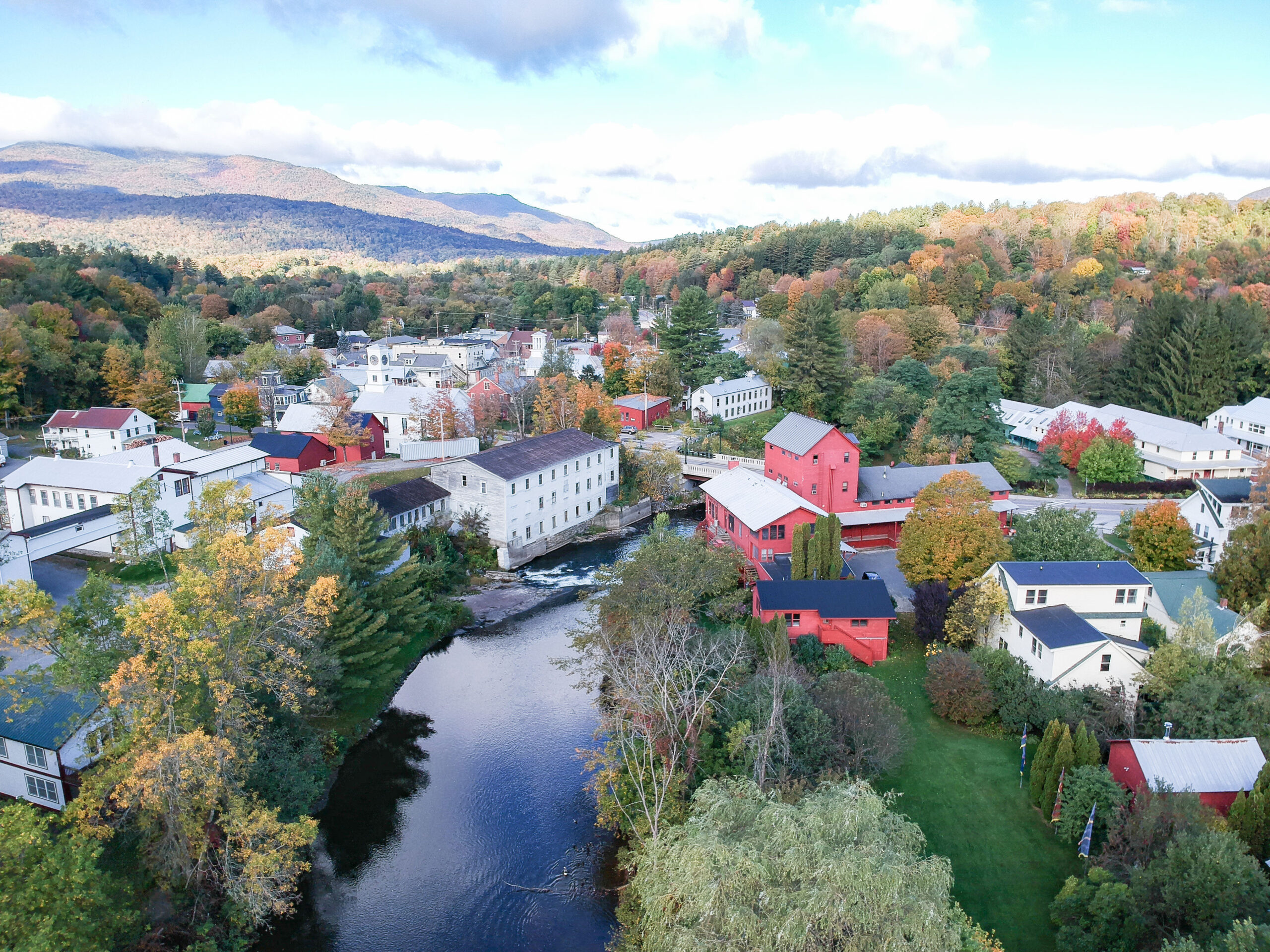An aerial shot of a Vermont village in summer.